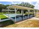 Enjoy the outdoor shuffleboard courts, featuring shaded seating and well-maintained playing surfaces for friendly competition at 5620 Illumination Ln, Leesburg, FL 34748