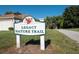 View of the Legacy Nature Trail sign on a clear day at 5620 Illumination Ln, Leesburg, FL 34748