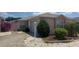 Lovely single-story home with a paved driveway, attached garage, and landscaped front yard at 627 Nuevo Leon Ln, The Villages, FL 32159