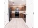 Well-equipped kitchen featuring stainless steel appliances and ample cabinet space at 8161 Cr 647, Bushnell, FL 33513