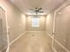 Bright, neutral bedroom featuring a ceiling fan and window to let in the natural light at 8949 Sw 76Th St, Ocala, FL 34481