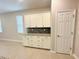 Dining area with built-in cabinets, granite countertop, and plenty of storage space at 8949 Sw 76Th St, Ocala, FL 34481