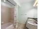Bathroom featuring a tiled shower and dual sinks at 911 Beverly Harbors Dr # 16, Leesburg, FL 34748