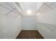 Walk-in closet with wire shelving and carpet at 911 Beverly Harbors Dr # 16, Leesburg, FL 34748
