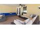 This large covered patio has seating areas and tile flooring at 10431 Reagans Run Dr, Clermont, FL 34711