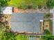 Bird's eye view of the house showing the roof, landscaping, backyard, and patio at 1109 Edmonds St, Leesburg, FL 34748