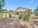 The charming backyard features a shed and landscaping that enhances outdoor appeal at 1109 Edmonds St, Leesburg, FL 34748