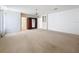 Large bedroom with carpet, a chandelier and a built-in cabinet at 1109 Edmonds St, Leesburg, FL 34748
