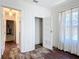 Bedroom featuring hardwood floors, a large window and closet at 1109 Edmonds St, Leesburg, FL 34748