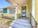 Inviting front porch with classic architectural details and decorative accents at 1109 Edmonds St, Leesburg, FL 34748