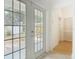 Hallway leads to the back yard and includes a storage closet at 1109 Edmonds St, Leesburg, FL 34748