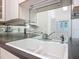 Kitchen sink area with stainless steel faucet and dark counter at 1109 Edmonds St, Leesburg, FL 34748