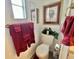 Toilet with decor and towels at 117 Jacaranda Dr, Leesburg, FL 34748