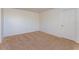 Vacant bedroom featuring neutral carpet, and white walls ready for customization at 12 Windtree Ln # 202, Winter Garden, FL 34787