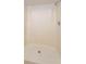 Bathroom featuring white shower with chrome fixtures at 12 Windtree Ln # 202, Winter Garden, FL 34787