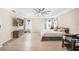 Spacious bedroom has wood floors, many windows, and tray ceilings at 12120 Sumter Dr, Orlando, FL 32824