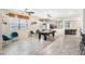Entertaining game room with a billiard table, stylish seating, and ample space for hosting gatherings at 12120 Sumter Dr, Orlando, FL 32824