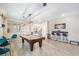 Spacious game room featuring a billiard table, stylish seating, and a bar area perfect for entertaining at 12120 Sumter Dr, Orlando, FL 32824