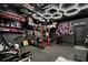 A modern home gym with state-of-the-art equipment and unique lighting, perfect for fitness enthusiasts at 12120 Sumter Dr, Orlando, FL 32824