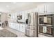 Modern kitchen featuring stainless steel appliances and granite countertops at 12120 Sumter Dr, Orlando, FL 32824