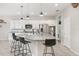 Bright kitchen with a large island featuring bar seating and stainless steel appliances at 12120 Sumter Dr, Orlando, FL 32824