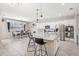 Bright and spacious kitchen featuring stainless steel appliances, a large island, and a connected dining area at 12120 Sumter Dr, Orlando, FL 32824
