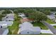 An aerial view showcasing home's roof and manicured backyard and neighborhood at 1225 Zapata Pl, The Villages, FL 32159