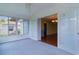 The Florida room connects to the interior of the home with wide sliding doors at 1225 Zapata Pl, The Villages, FL 32159
