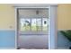 View from inside a home looking into a brightly lit Florida room at 1225 Zapata Pl, The Villages, FL 32159