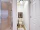 Cozy bathroom featuring a shower and toilet room combo at 167 Castaway Beach Way, Kissimmee, FL 34746