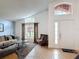 Inviting living room with vaulted ceilings and plenty of natural light at 167 Castaway Beach Way, Kissimmee, FL 34746