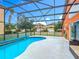 Screened-in pool with a covered enclosure offering privacy and outdoor enjoyment at 167 Castaway Beach Way, Kissimmee, FL 34746