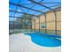 Screened-in pool with a covered enclosure offering privacy and outdoor enjoyment at 167 Castaway Beach Way, Kissimmee, FL 34746