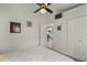 Minimalist bedroom with closet and doorway with sightlines to living room at 168 Pond Rd, Mount Dora, FL 32757