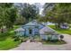 Attractive home featuring a well-maintained front yard, tasteful landscaping, and a welcoming facade at 168 Pond Rd, Mount Dora, FL 32757