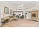 Bright living room with high ceilings, large windows, and elegant furnishings at 168 Pond Rd, Mount Dora, FL 32757
