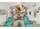 Cozy living room with stone fireplace, and comfortable seating at 168 Pond Rd, Mount Dora, FL 32757