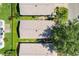 Aerial view of neighborhood homes, featuring landscaped yards and tree coverage at 16938 Se 94Th Sunnybrook Cir, The Villages, FL 32162