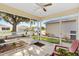 Enjoy the view from this screened-in porch with an outdoor space at 16938 Se 94Th Sunnybrook Cir, The Villages, FL 32162