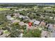 Aerial view of a home surrounded by lush greenery and a quiet neighborhood at 1808 Westpointe Cir, Orlando, FL 32835