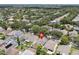 This aerial view shows the home's position in a neighborhood with mature trees and nearby community features at 1808 Westpointe Cir, Orlando, FL 32835