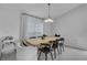 Dining room with natural light and seating for six at 1808 Westpointe Cir, Orlando, FL 32835