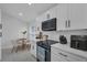 Modern kitchen featuring white cabinetry and stainless steel appliances at 1808 Westpointe Cir, Orlando, FL 32835
