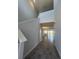 Bright entryway with soaring ceilings and views of the living area and backyard through sliding glass doors at 2064 Asher Ave, Minneola, FL 34715