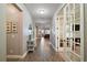 Inviting entryway with stylish wood-look floors leads into the spacious living area of this beautiful home at 2136 Lula Rd, Minneola, FL 34715