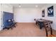 Spacious basement featuring a ping pong table and air hockey table at 2161 Cedar Springs Way, Minneola, FL 34715