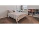 Bedroom featuring bed, shelves, and work desk in a carpeted area at 2161 Cedar Springs Way, Minneola, FL 34715