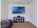 Large living room featuring flat screen television and comfortable lounge area at 2161 Cedar Springs Way, Minneola, FL 34715