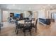 Open-concept living space featuring a dining area, Gathering room and modern kitchen for entertaining and Gathering time at 2161 Cedar Springs Way, Minneola, FL 34715