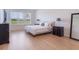 Light and bright main bedroom with lots of natural light and hardwood floors at 2161 Cedar Springs Way, Minneola, FL 34715